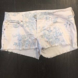 White with blue flowers